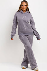 hoodie and joggers tracksuit set with bubble puffed up crosses styled up