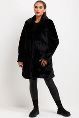 faux fur belted coat with button fastening black