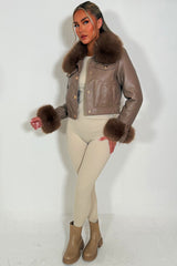 womens fur cuff and collar faux leather jacket with gold buttons styled up