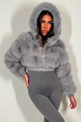 fur jacket with hood styled up