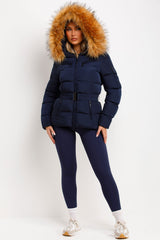 womens winter coat with faux fur hood and belt styled up