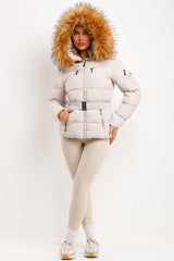 puffer jacket with fluffy fur hood styled up