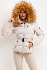 womens winter coat with faux fur hood styled up 