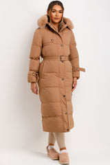 womens longline puffer coat with fur hood and belt for winter