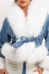 white faux fur denim jacket with fur cuffs and waist belt womens outerwear christmas market outfit styledup