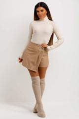 womens faux leather wrap over detail shorts with gold buttons