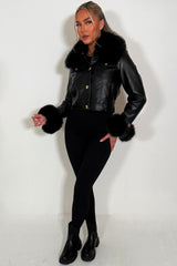 womens fur cuff and collar faux leather jacket with gold buttons styled up