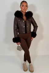 faux fur hood faux fur cuff faux leather jacket with gold buttons styledup uk 