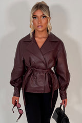 womens lapel collar faux leather double breasted jacket with button and belt fastening zara uk styledup 