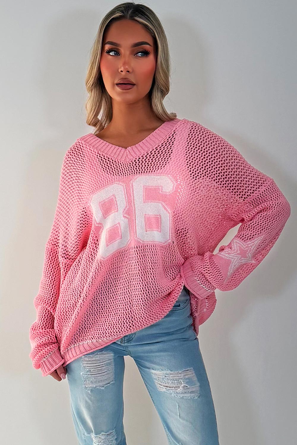 pink long sleeve knitted jumper with boston slogan styledup 