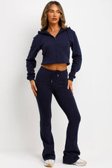 interlock sweatshirt and bell bottom top stitched trousers two piece loungewear set 