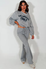 womens los angeles california slogan oversized crop sweatshirt and flare trouser two piece co ord set grey styledup 