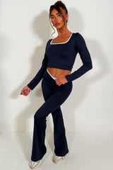 womens v waist flared yoga pants and long sleeve top two piece co ord set styled up 