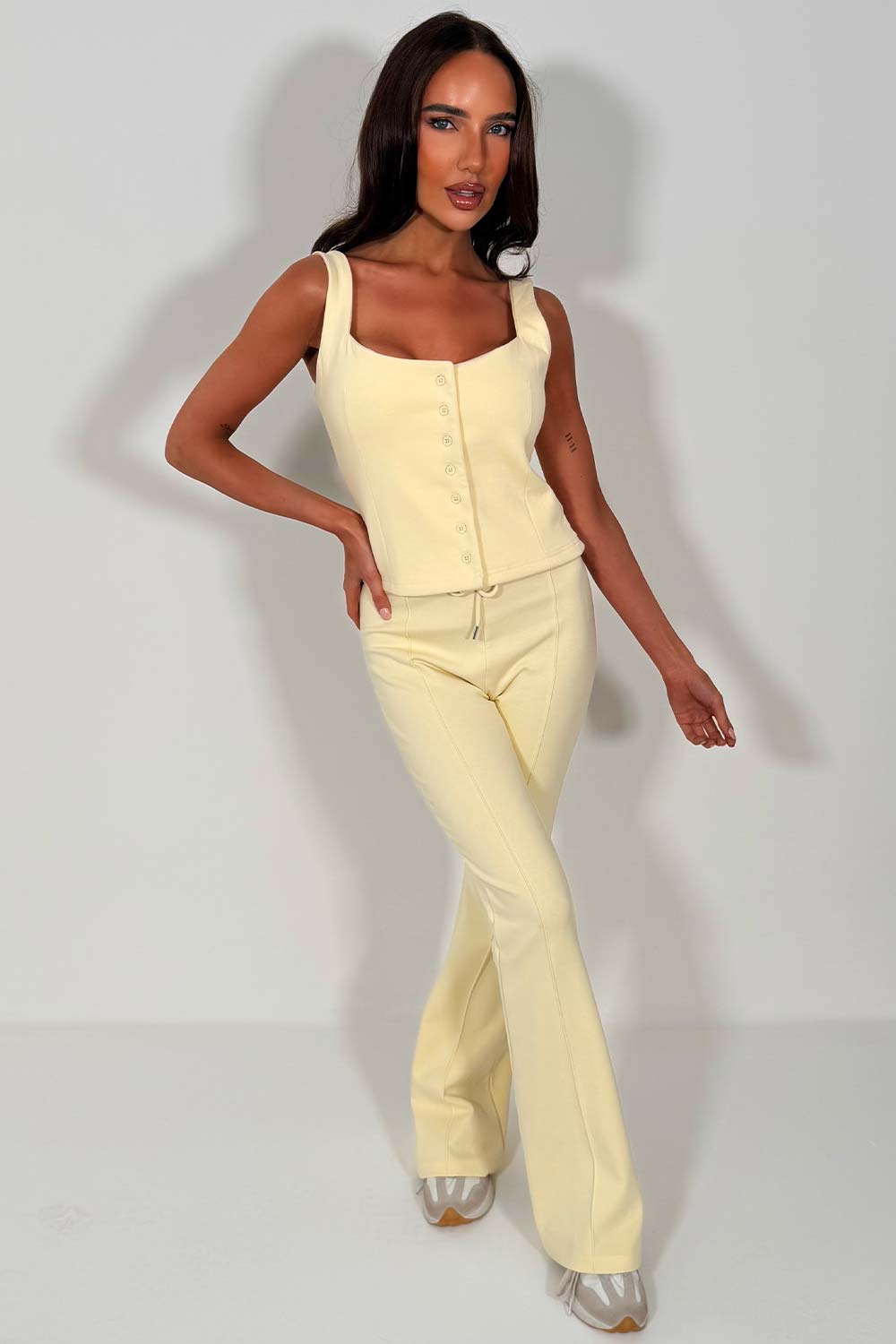 yellow flare trousers and button up top two piece co ord set pink styledup 