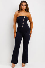 wedding guest jumpsuit with gold buttons strapless 