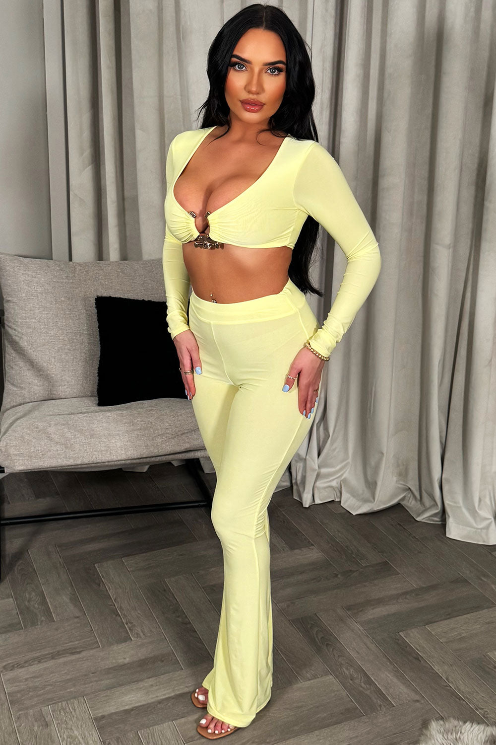 yellow skinny flare trousers and long sleeve crop top co ord set going out festival outfit