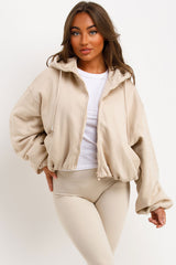 womens hooded jacket with elastic hem long sleeves and double welt pockets zara uk 
