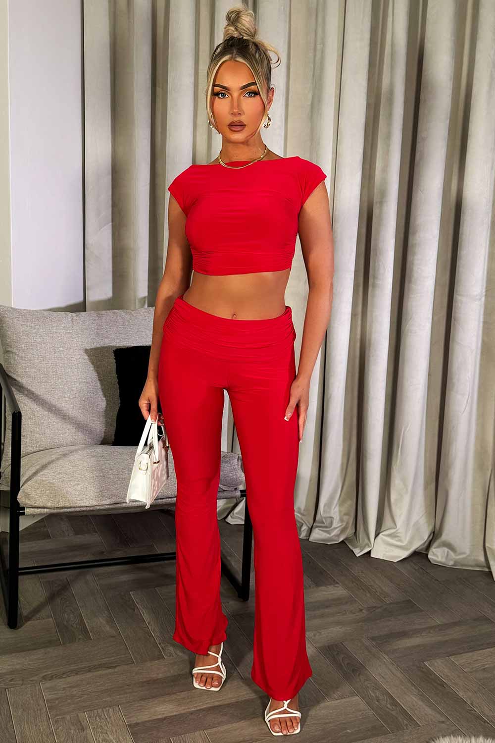 fold over detail skinny flare trousers and backless crop top co ord set going out outfit