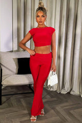 fold detail flare trousers and backless crop top co ord set