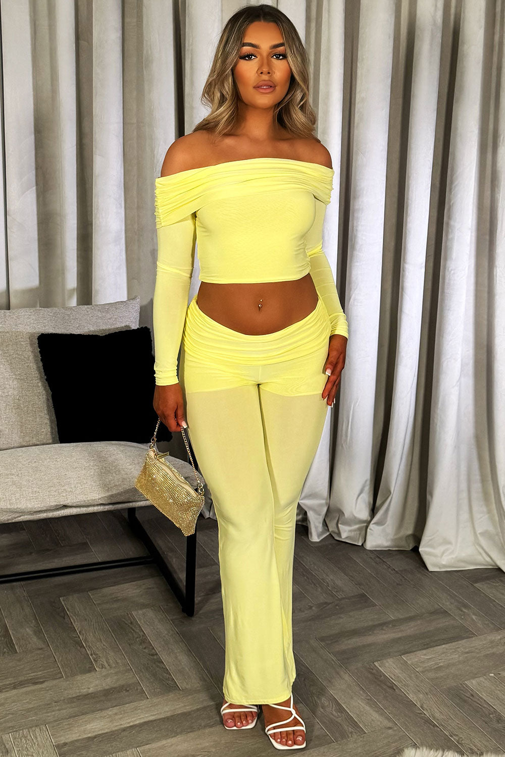 fold detail flare trousers and off shoulder long sleeve crop top two piece set going out meal brunch outfit yellow