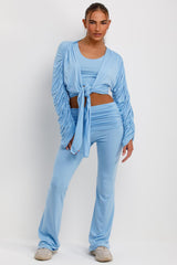 fold detail flare trousers crop top and ruched sleeve cardigan three piece co ord set loungewear