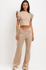 womens frill ruffle sleeve top and skinny flare trousers with fold details