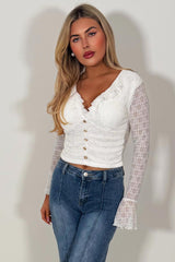 womens long sleeve summer holiday festival top with ruffle frilly hem gold buttons styledup fashion uk 