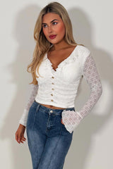 frilly ruffle long sleeve top with gold buttons summer holiday outfit 