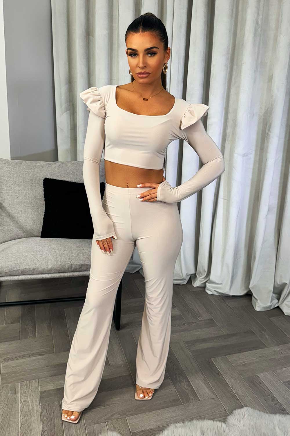 long sleeve frill shoulder crop top and straight leg trousers two piece co ord going out outfit