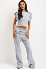 ruffle frill sleeve top and skinny flare trouaers with fold detail two piece set