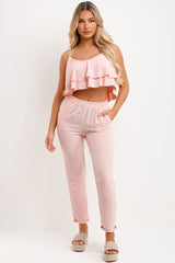 matching ruffle top and trousers set womens