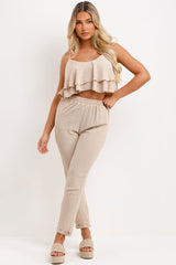matching ruffle top and trousers set womens