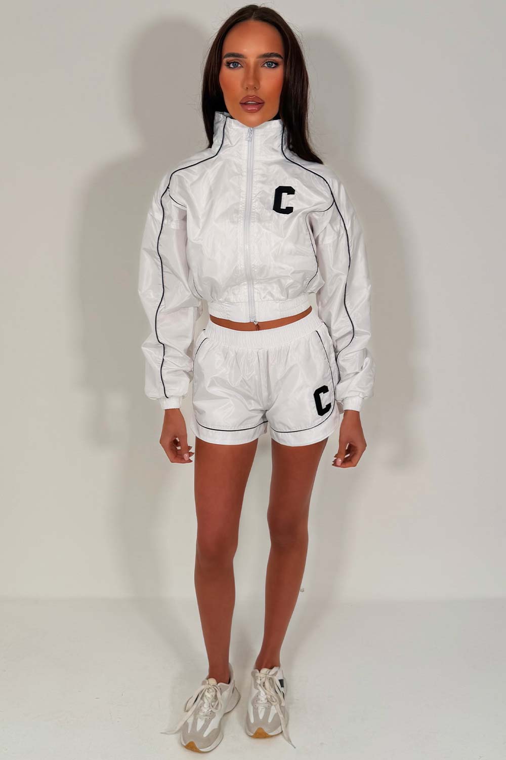 funnel neck jacket and shorts tracksuit two piece co ord set womens summer holiday outfit 