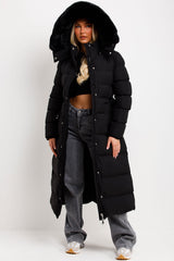 womens black puffer padded long coat with fur hood and belt styledup 