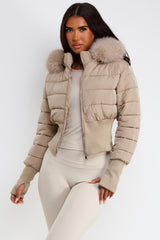 faux fur hood padded puffer jacket with cinched waist womens winter ski outerwear styledup uk