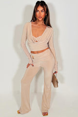 gold buckle twist front skinny flare trouser and long sleeve cut out twist front crop top two piece co ord set styledup 