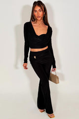 long sleeve cut out top and skinny flare trouser two piece co ord set black night out occasion outfit styledup 