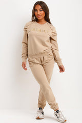 gold button frill shoulder top and trousers loungewear set womens summer airport outfit