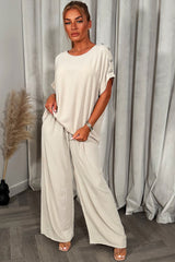 gold button shoulder top and trousers co ord set christmas party outfit