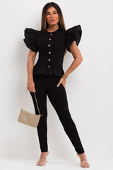 peplum hem ribbed co ord with ruffle frill sleeves and gold buttons