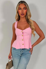 going out peplum top with gold buttons styledup 