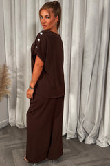 christmas party co ord with gold button shoulder top and trousers outfit for womens