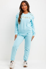 frill ruffle frill shoulder top and trousers lounge set with gold buttons styledup