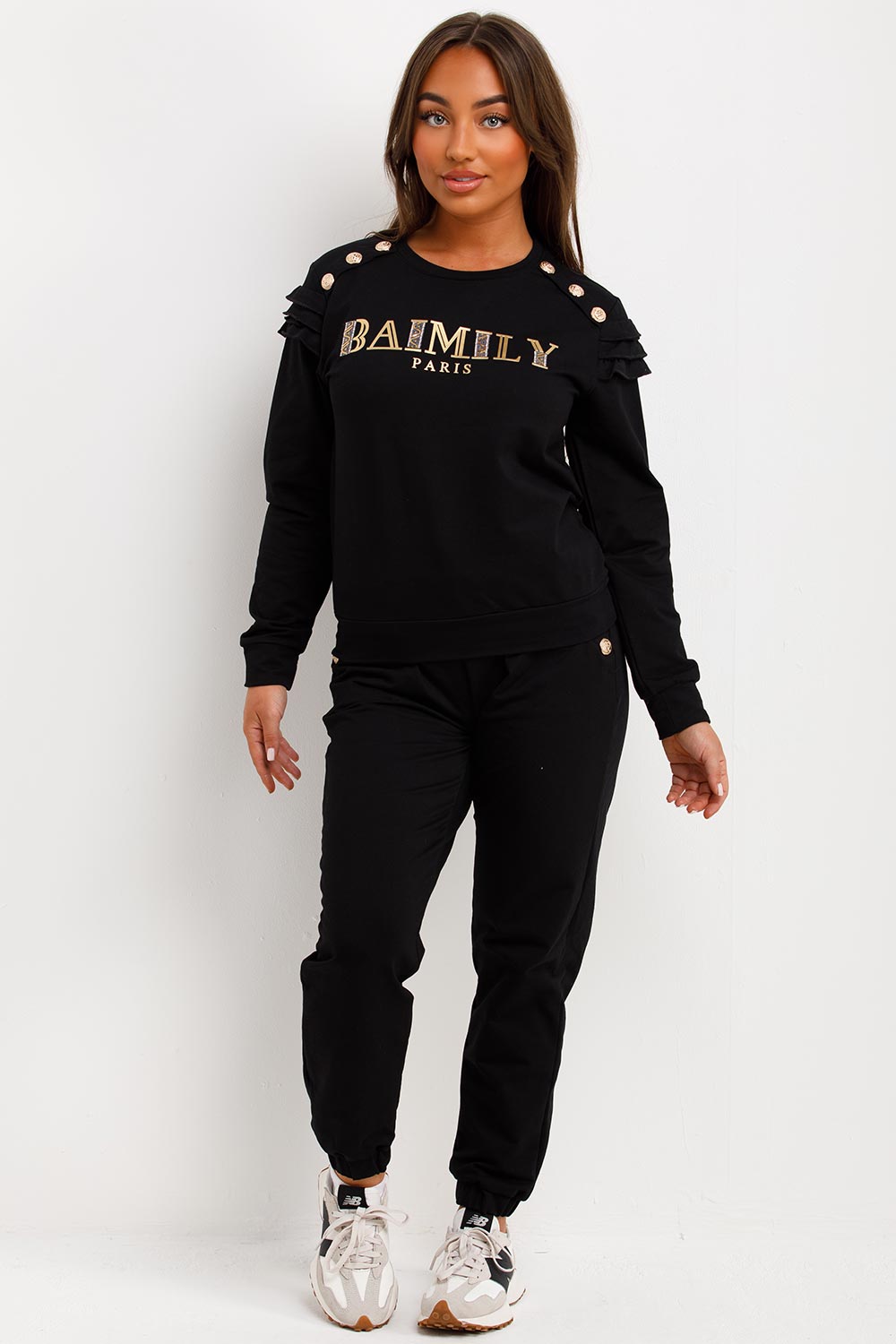 gold button frill shoulder top and trousers loungewear set womens summer airport outfit