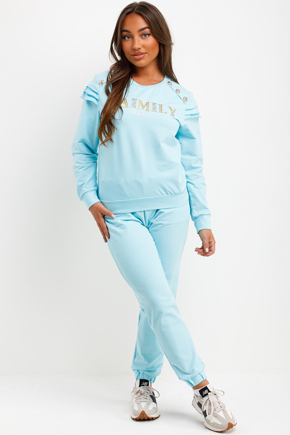 gold button frill shoulder top and trousers loungewear set womens summer airport outfit