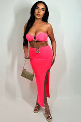 neon pink bandeau top and side cut maxi skirt with gold buckle set going out holiday festival outfit