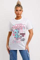 womens white t shirt with teddy bear graphics and zero regrets slogan