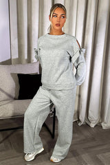 womens loungewear co ord set with cut out shoulders and bow detail