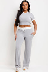 grey ribbed wide leg trousers and crop top co ord lounge set airport outfit