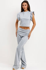 low rise flare trousers and frill ruffle top two piece set